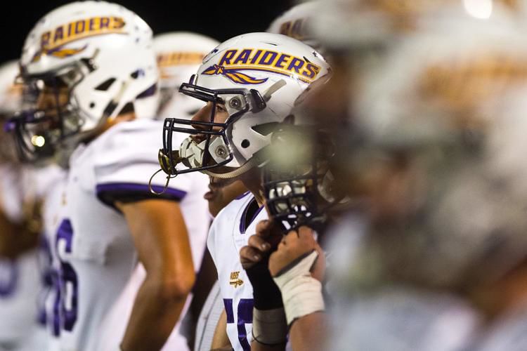 NCHS cruises past Bloomington in the schools' 105th football meeting